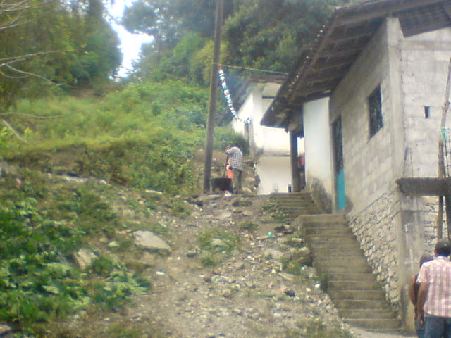 Preparando  cicharrones (Odilon Reyes Trinidad)